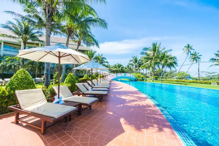 Hammocks under palm trees at Vienice's Resort